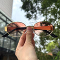 Luxuriöse Unisex-Sonnenbrille aus Metall, ovale Form, modisch, UV400-Schutz, elegante Farbtöne für Damen und Herren